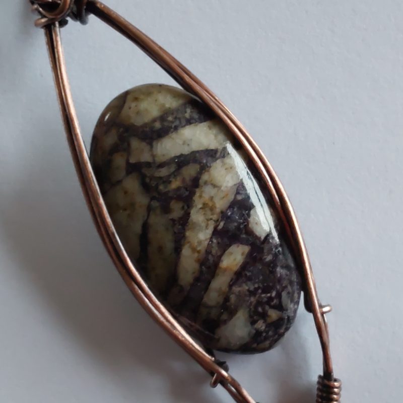 Wire wrapped Flourite in Feldspar cabochon pendant.