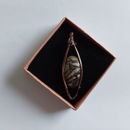 Wire wrapped Flourite in Feldspar cabochon pendant.