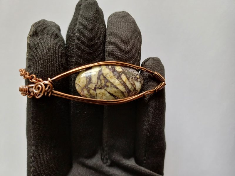 Wire wrapped Flourite in Feldspar cabochon pendant.