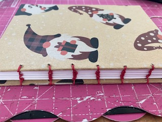 Coptic binding with a gonk theme.