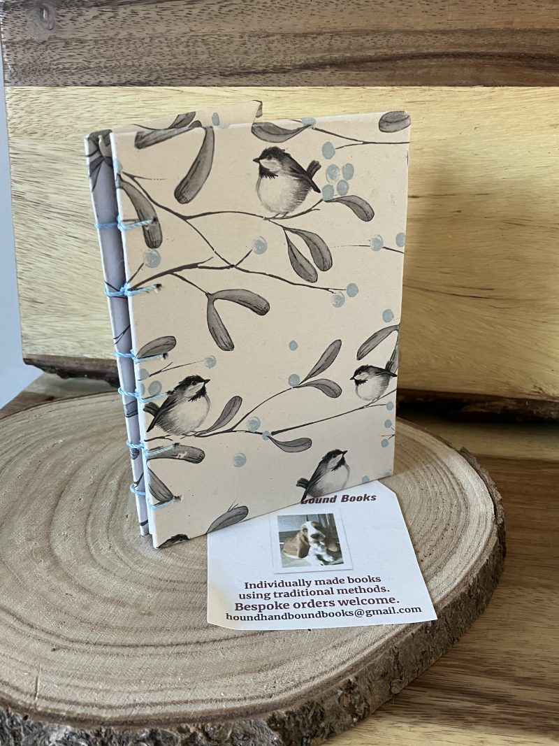 Handmade notebook with robin design.