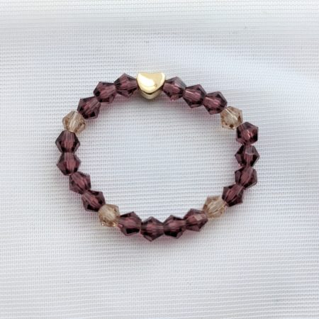 Children's purple crystal bracelet with gold heart