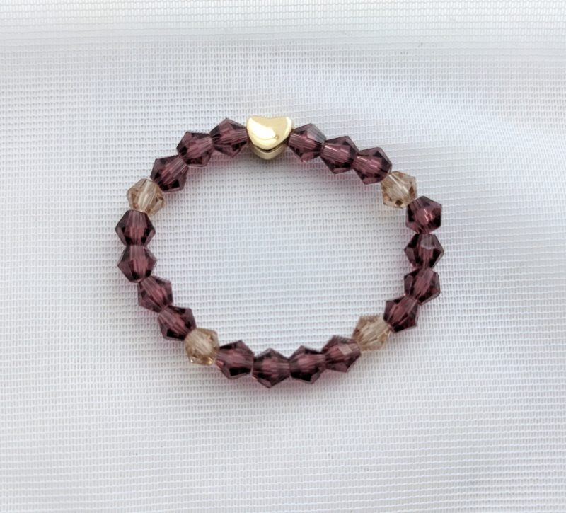 Children's purple crystal bracelet with gold heart