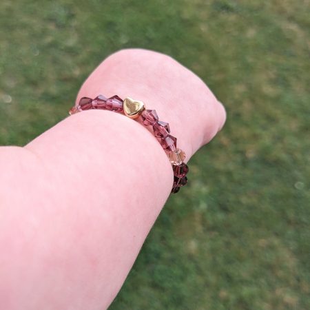 Children's purple crystal bracelet with gold heart