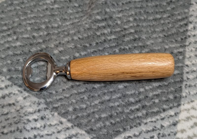 Bottle opener made from Beech wood with a stainless steel opener