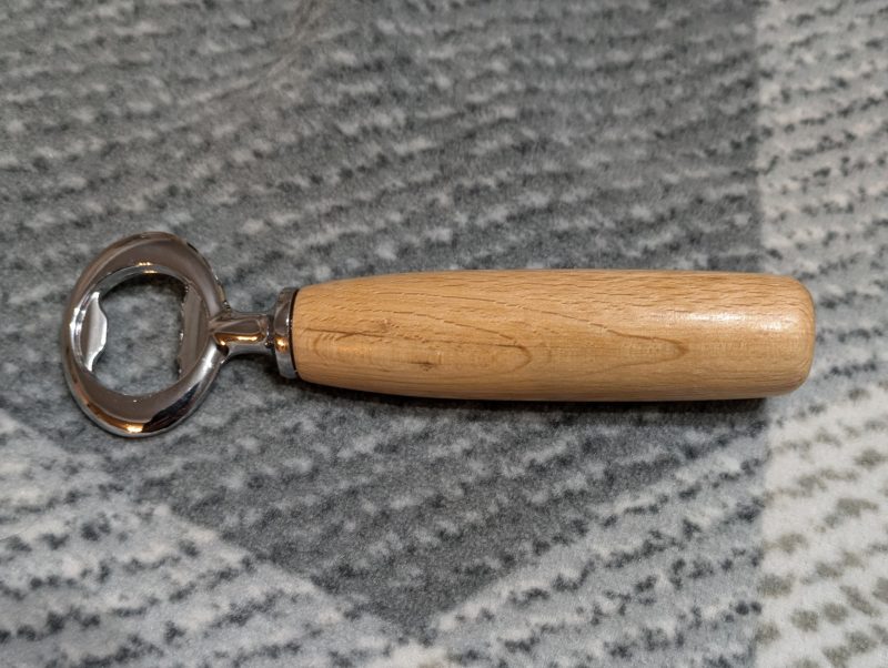 Bottle opener made from Beech wood with a stainless steel opener