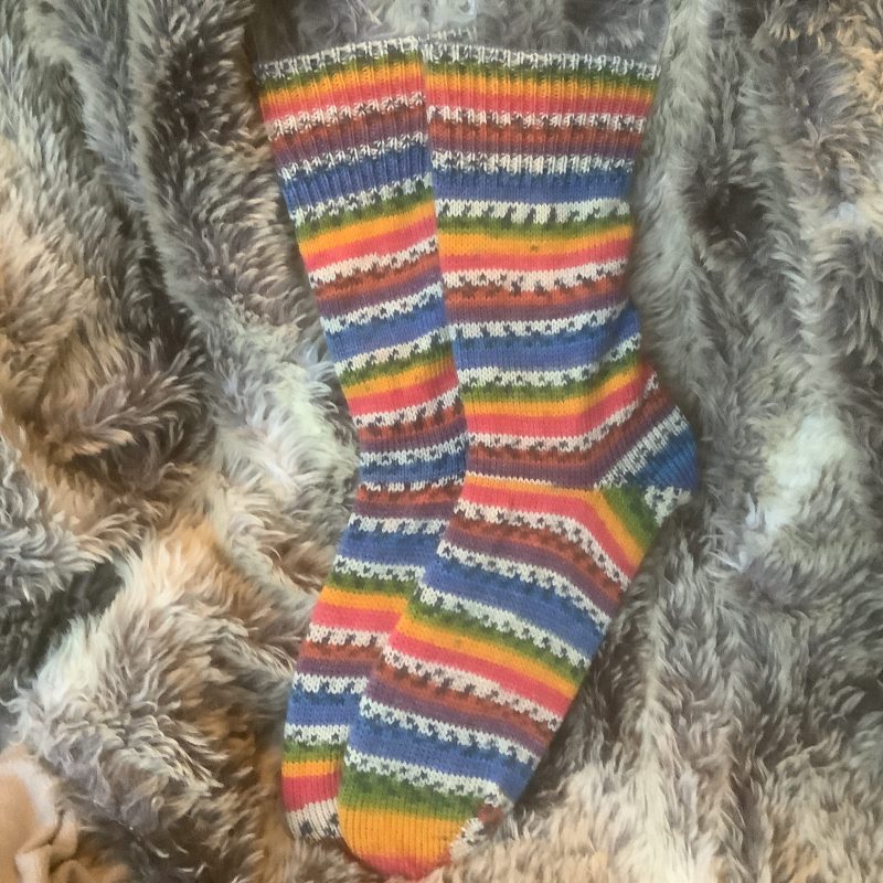 Hand crafted socks ( yarn design Kim) four different size ranges
