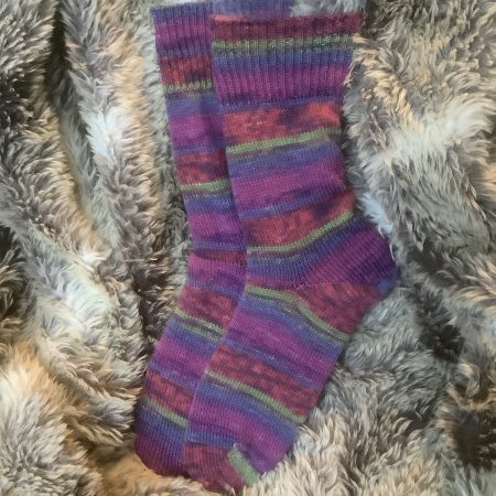Hand crafted socks ( yarn design George)four different size ranges available