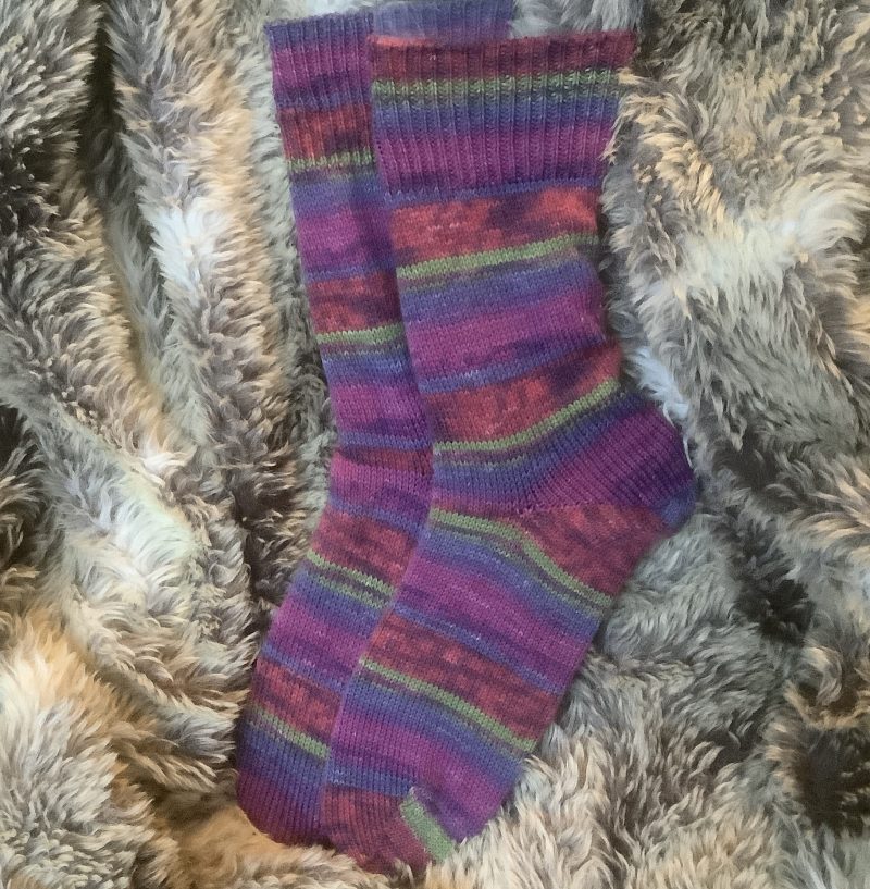 Hand crafted socks ( yarn design George)four different size ranges available