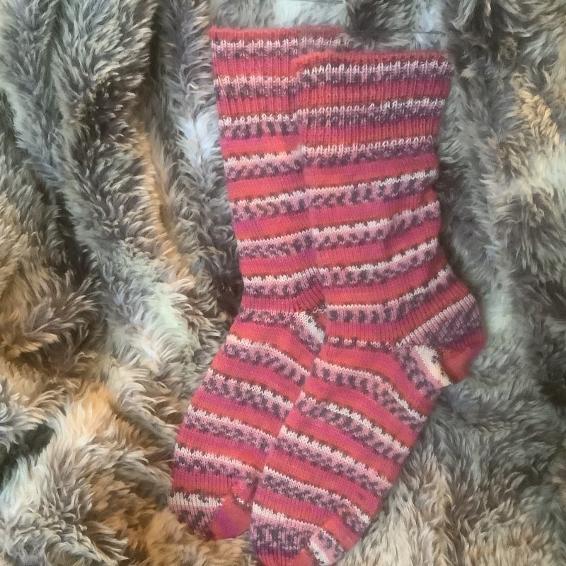 Hand crafted socks ( yarn design Claire) Four different size ranges available