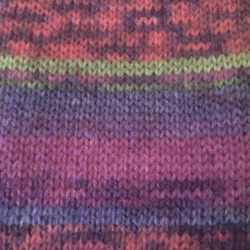 Pocket size dinky hot water bottle with hand crafted cover ( yarn design George)