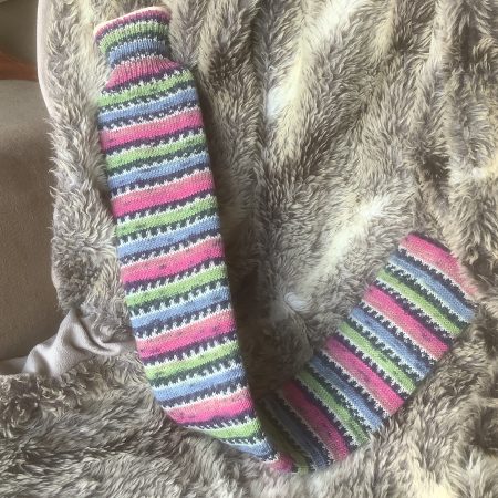 Extra long hot water bottle with hand crafted cover (yarn design sunny)