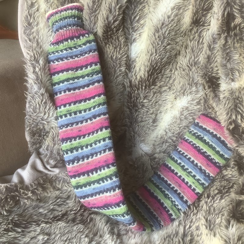 Extra long hot water bottle with hand crafted cover (yarn design sunny)