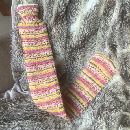 Extra long hot water bottle with hand crafted cover ( yarn design Princess)
