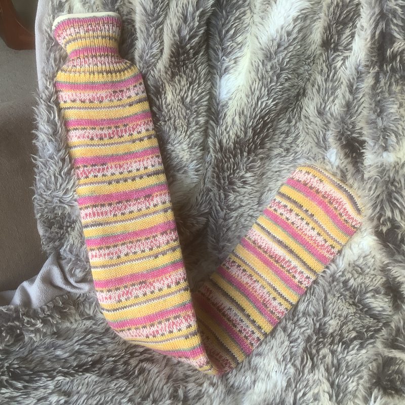 Extra long hot water bottle with hand crafted cover ( yarn design Princess)