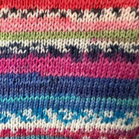 Extra long hot water bottle with hand crafted cover ( yarn design Random)