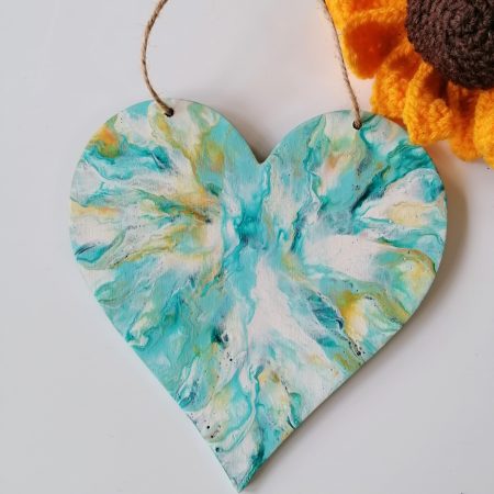 Decorative wooden heart wall hanging hand painted with turquoise, white, teal and metallic gold. Good size 15cm, with jute cord ready to hang on the wall.