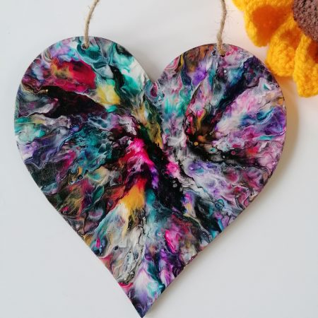 Bold colourful hand painted wooden heart wall decoration. Acrylic pour, abstract painting with hot pink, purple, teal, gold, black and white. Colourful and dramatic, good size wooden heart 15cm by 15cm. With jute cord ready to hang on the wall.