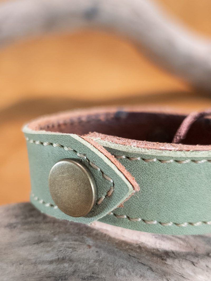 Bracelet with die-cut filigree and rivets | handmade genuine leather | green and brown color.
