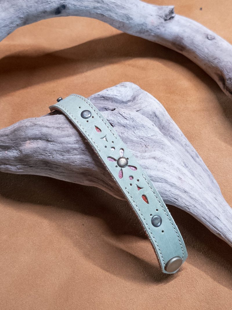 Bracelet with die-cut filigree and rivets | handmade genuine leather | green and brown color.