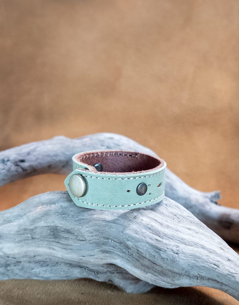 Bracelet with die-cut filigree and rivets | handmade genuine leather | green and brown color.