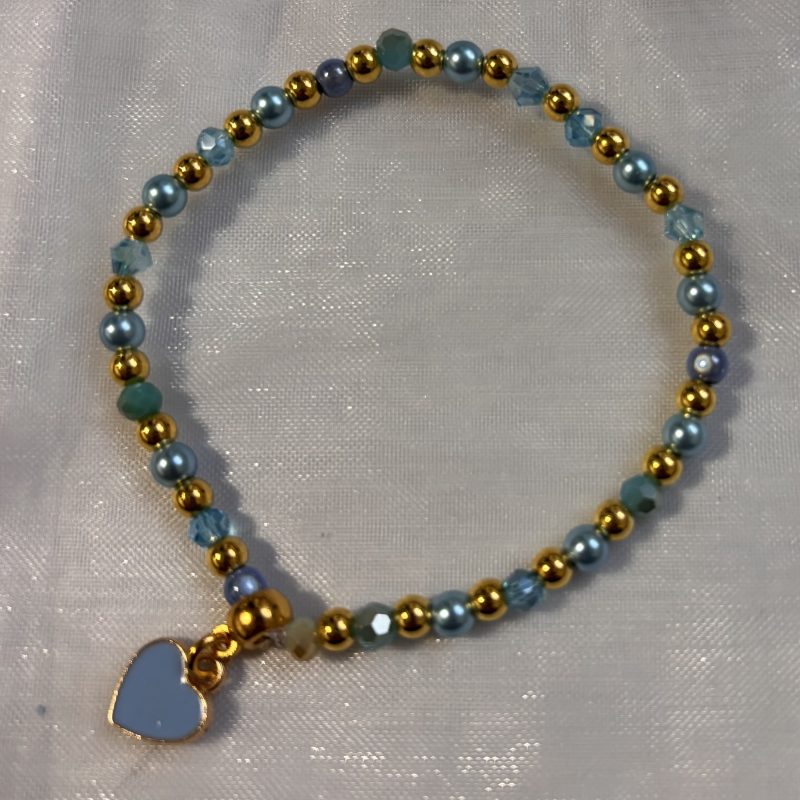 Stretch multi-bead bracelet with enamel heart charm