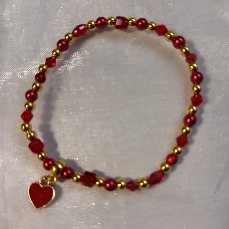 Stretch multi-bead bracelet with enamel heart charm