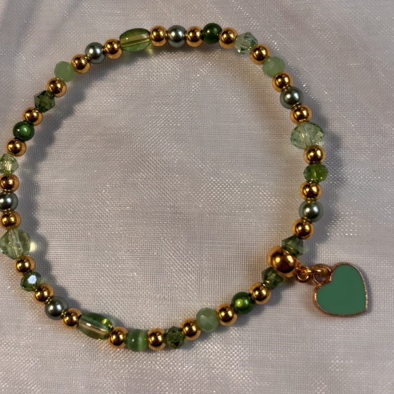 Stretch multi-bead bracelet with enamel heart charm