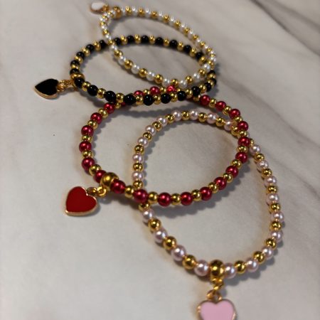 Stretch faux pearl bracelet with heart charm
