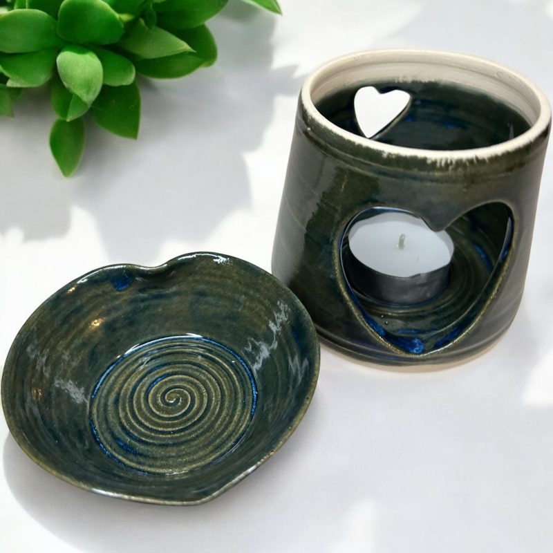 Handthrown beautiful heart shaped oil burner with detachable lid.