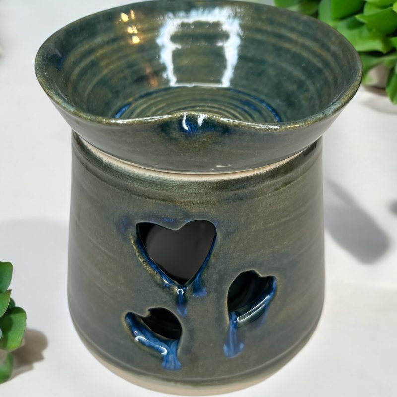 Handthrown beautiful heart shaped oil burner with detachable lid.