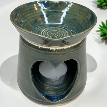 Handthrown beautiful heart shaped oil burner with detachable lid.