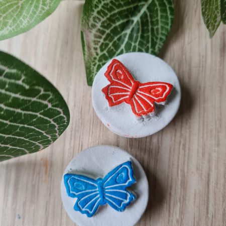2 Clay butterfly magnets blue and red