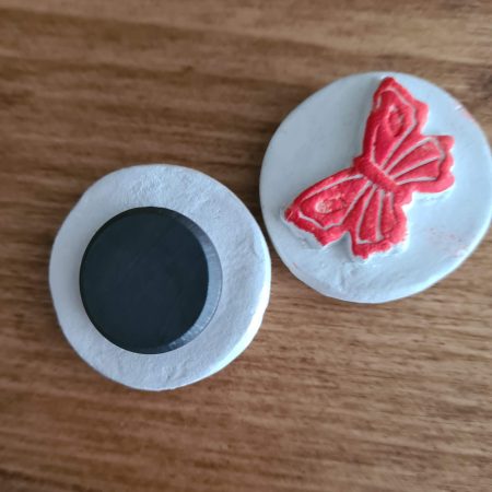2 Clay butterfly magnets blue and red