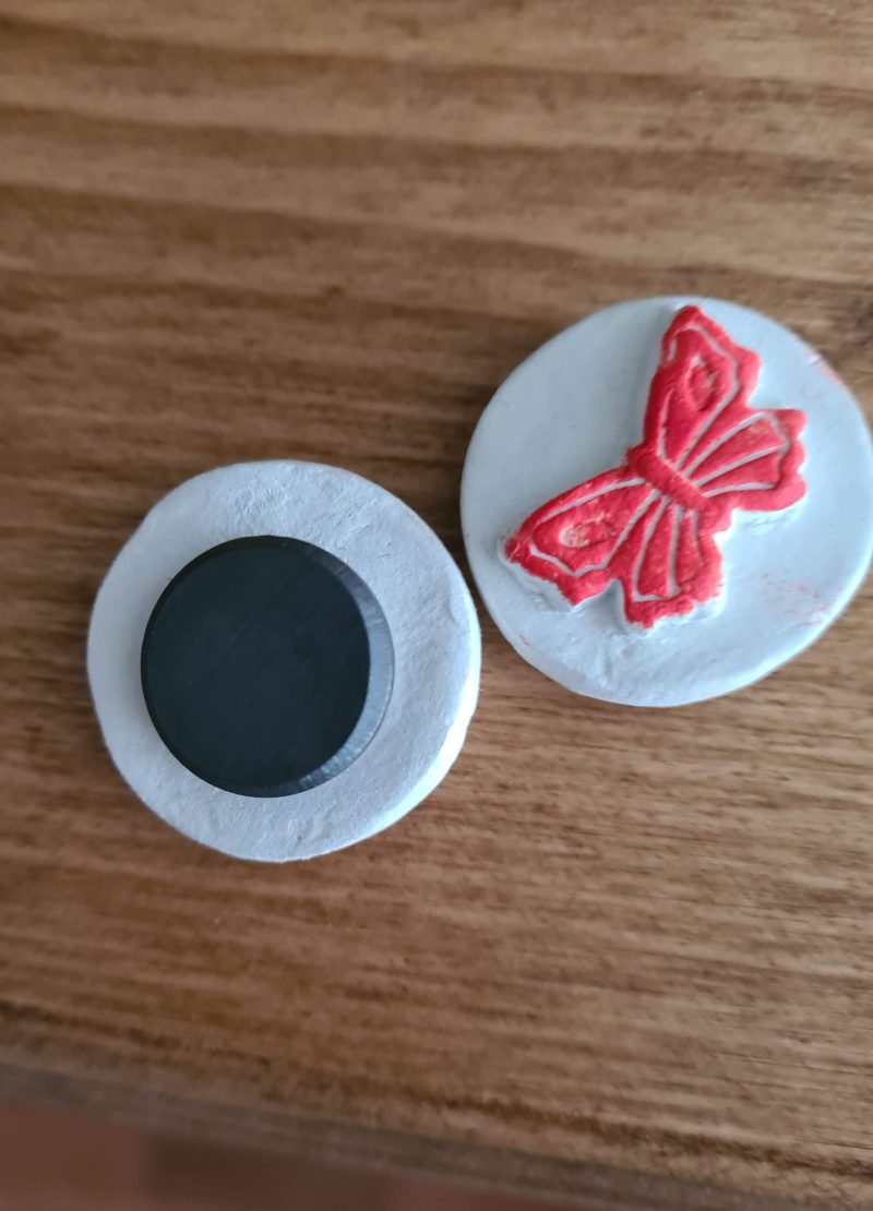 2 Clay butterfly magnets blue and red