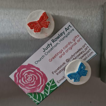 2 Clay butterfly magnets blue and red