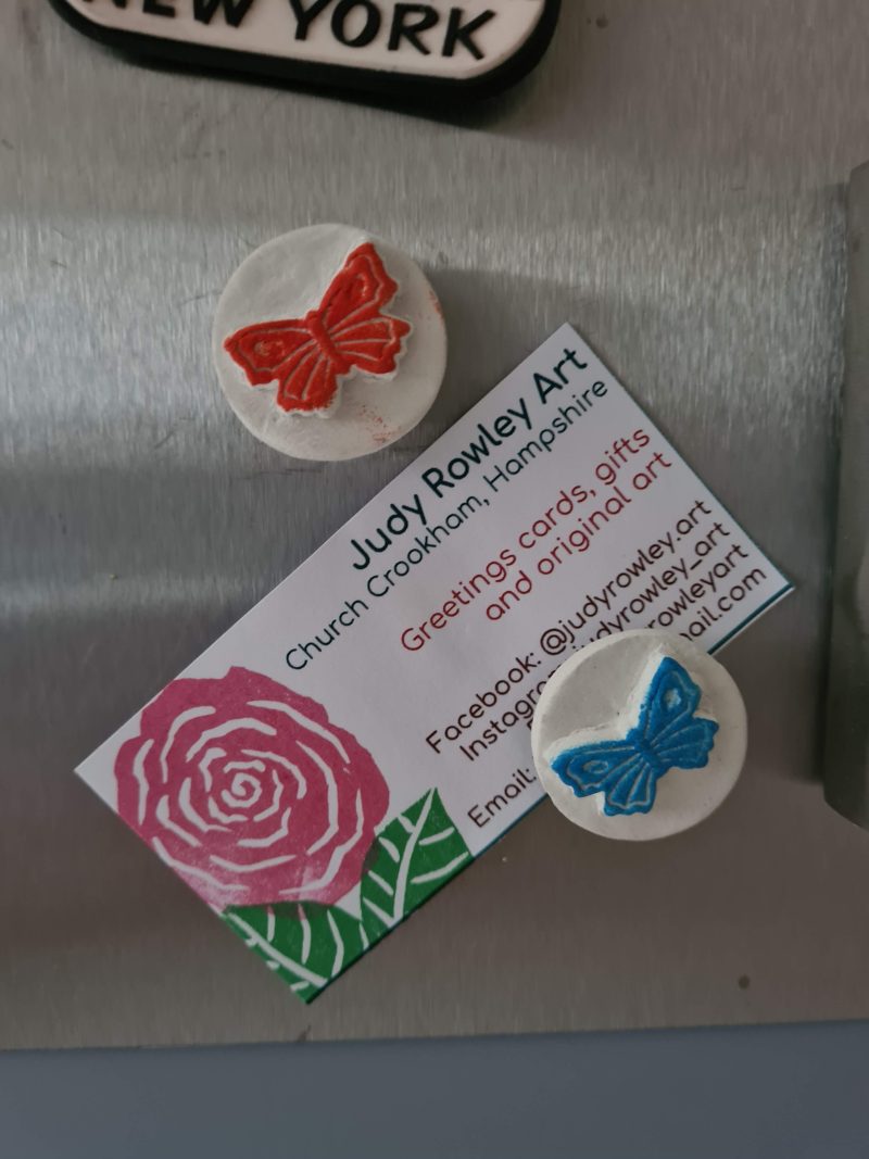 2 Clay butterfly magnets blue and red