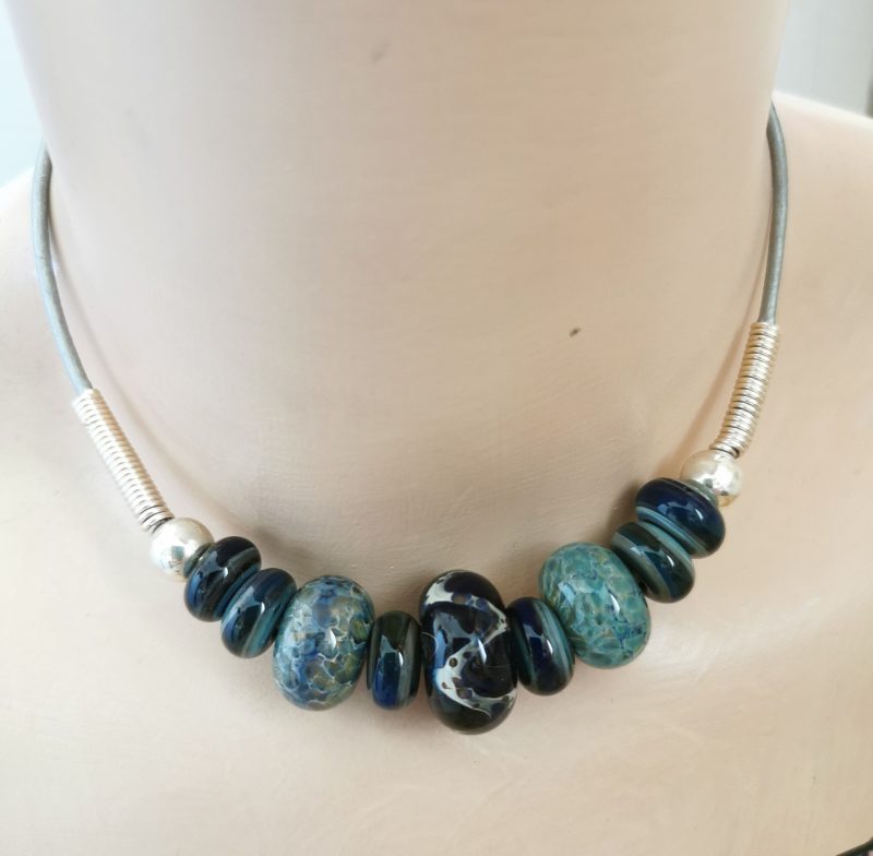 Lampwork glass thong necklace | green blue black glass beads | silver grey leather cord