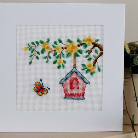 A Handmade Cross Stitch Greetings card framed in a White Aperture card left black inside for you to add your own personal message for any loved one