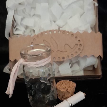 Message in a bottle in gift box