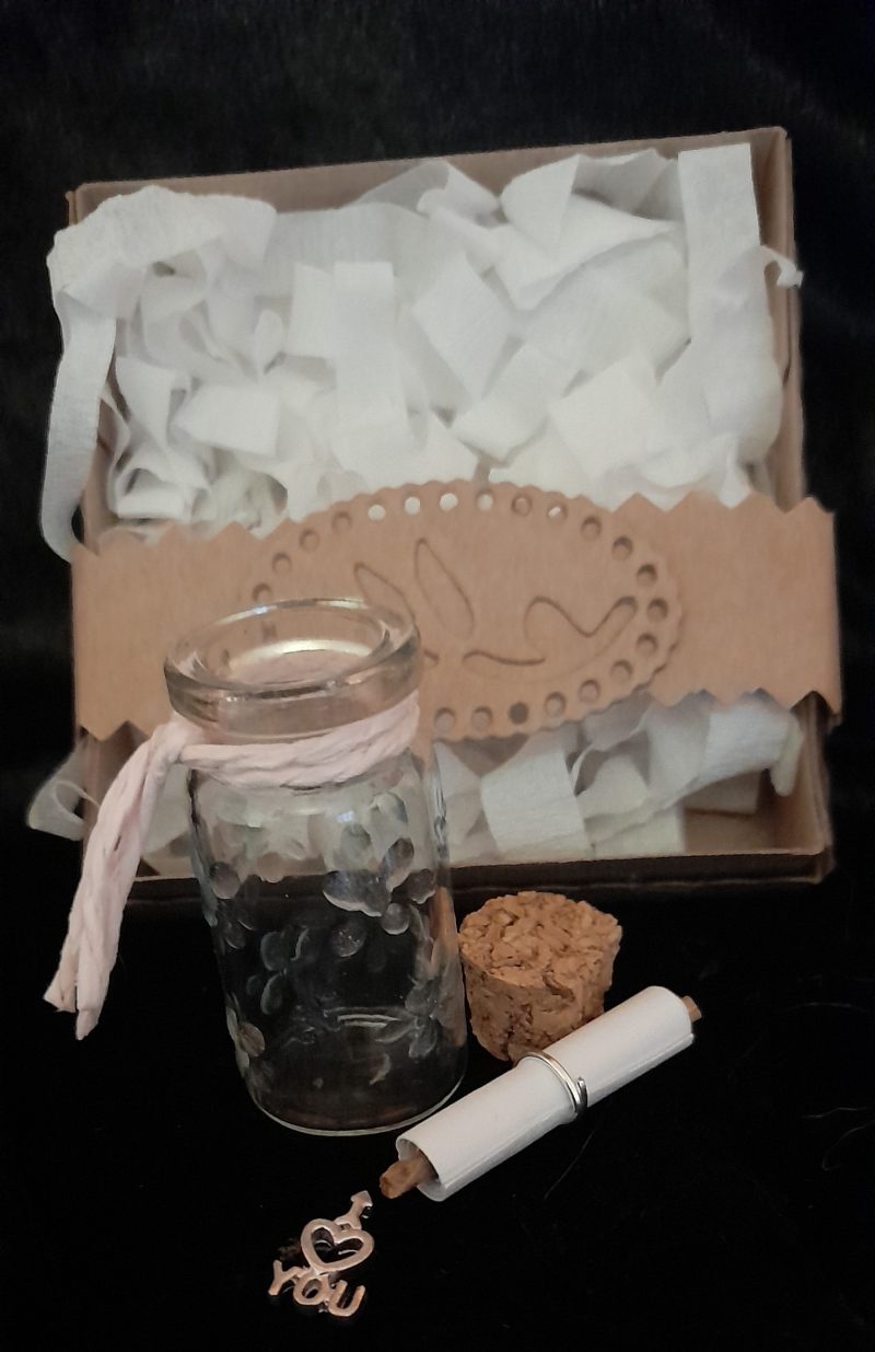 Message in a bottle in gift box
