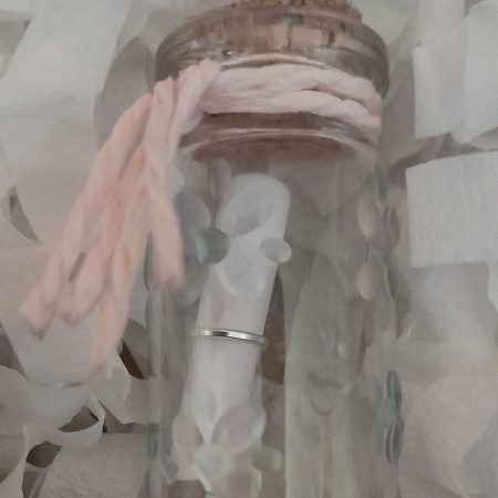 Message in a bottle in gift box