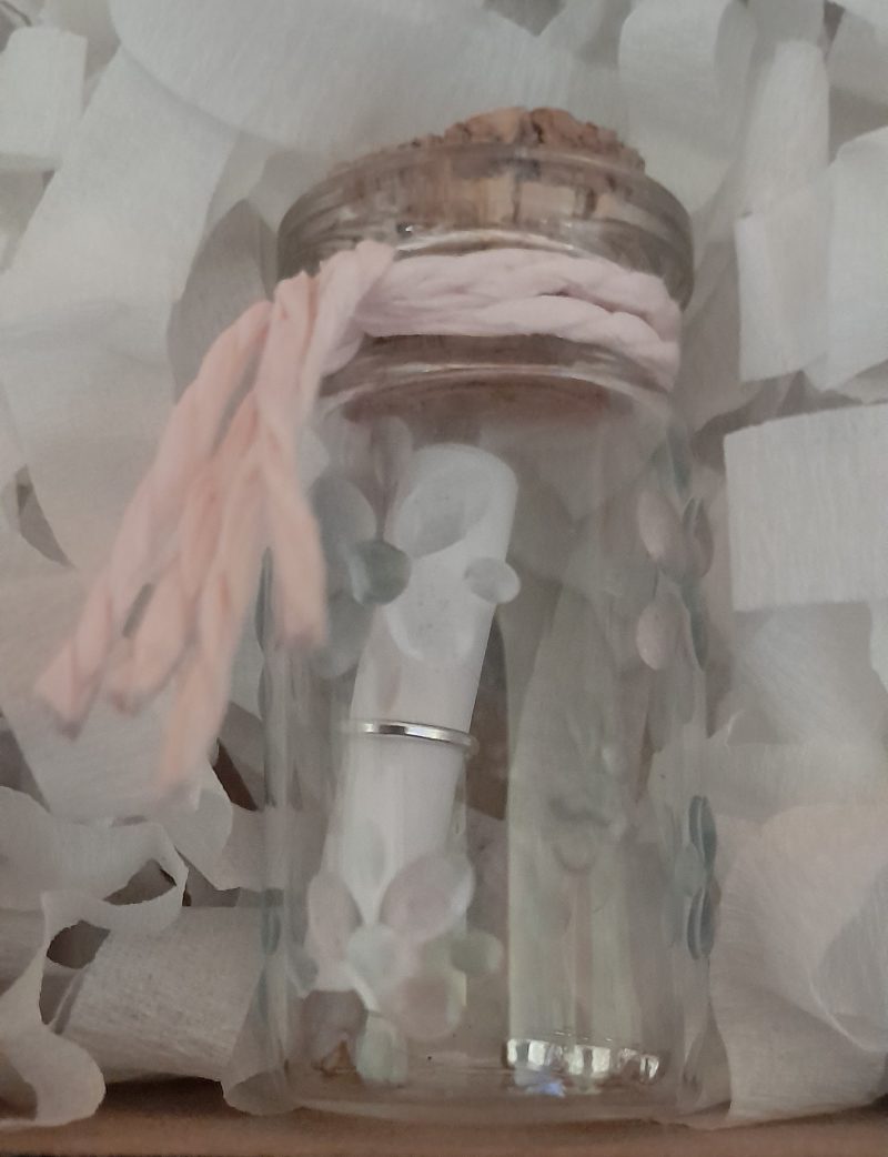 Message in a bottle in gift box