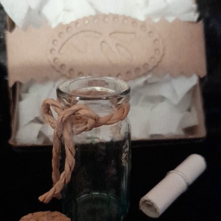 Message in a bottle in gift box