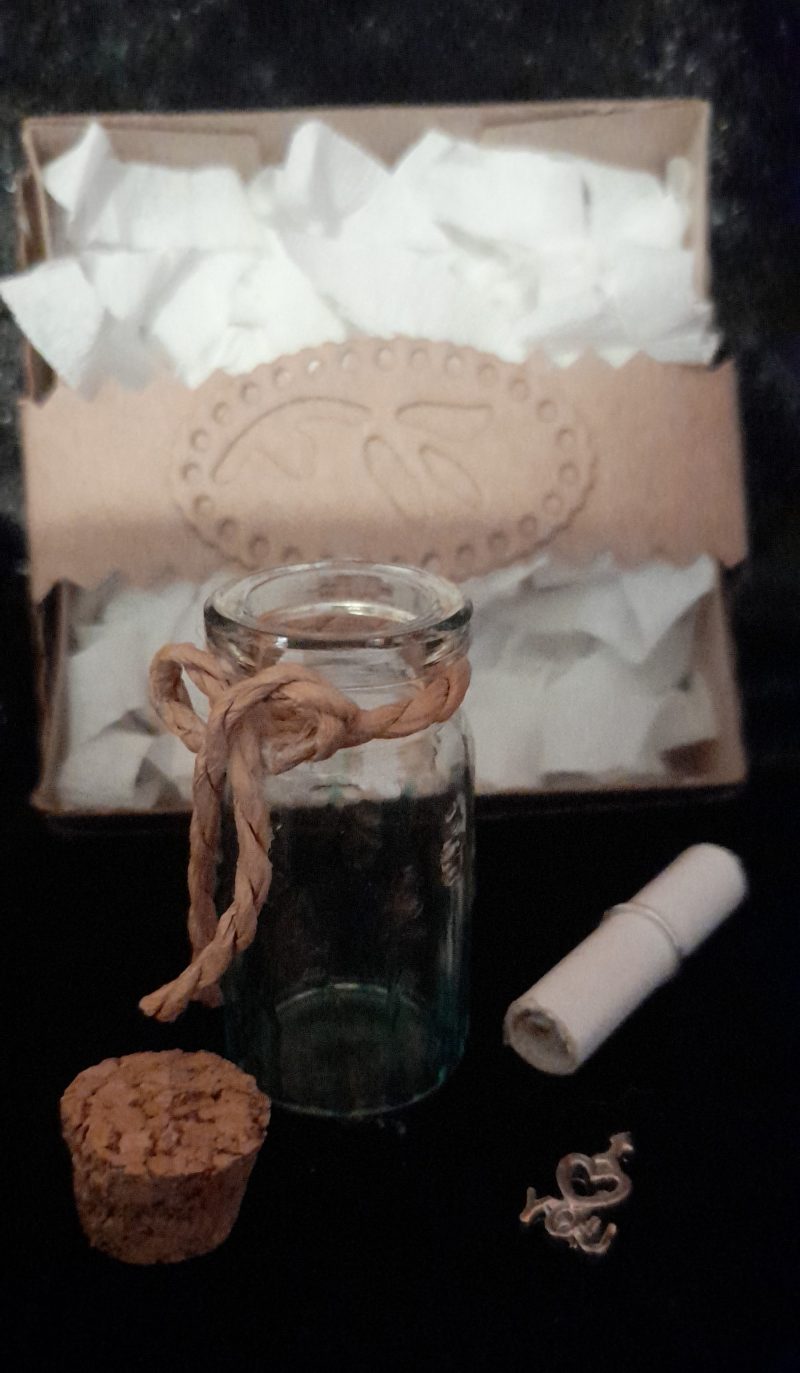 Message in a bottle in gift box