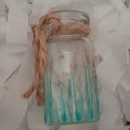Message in a bottle in gift box