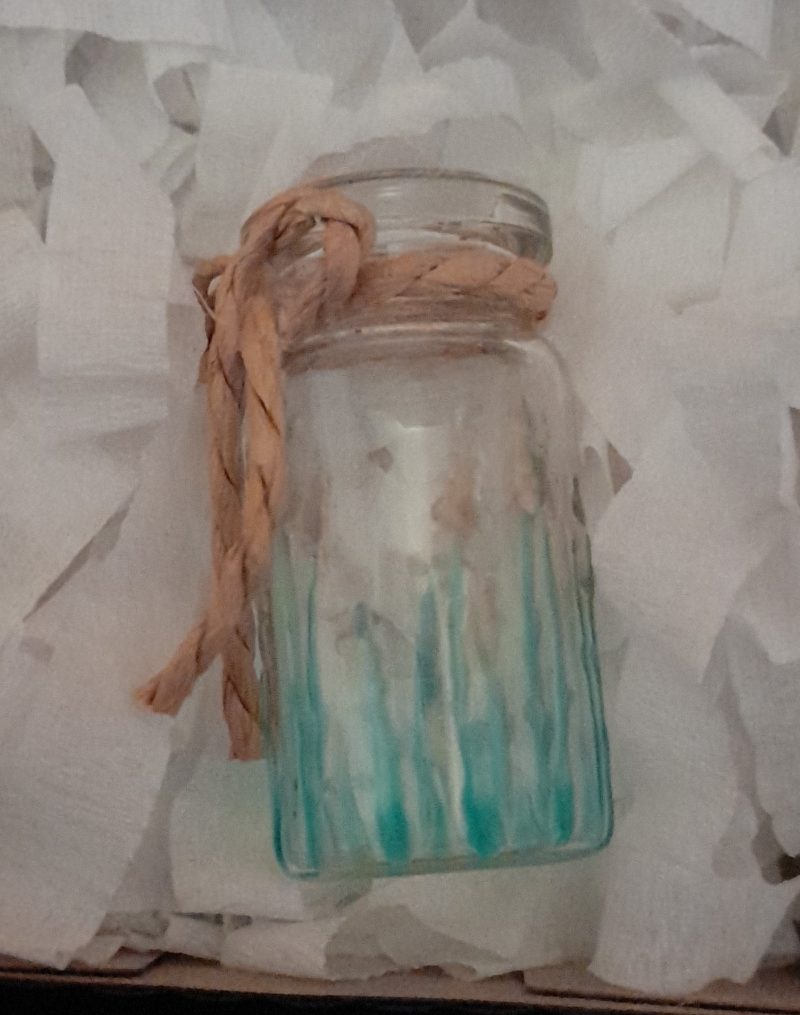 Message in a bottle in gift box