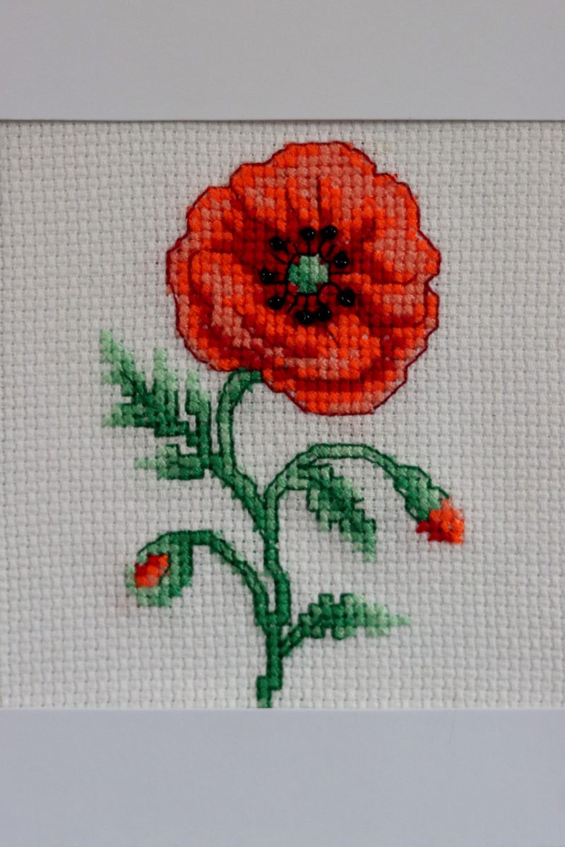 A Handmade Cross Stitch Greetings card framed in a White Aperture card left black inside for you to add your own personal message for any loved one