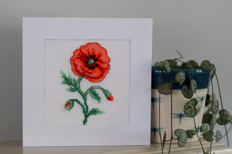 A Handmade Cross Stitch Greetings card framed in a White Aperture card left black inside for you to add your own personal message for any loved one