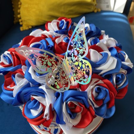 Medium sized round box of hand made Ribbon Roses